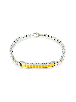 Pulseira masculina de aço inox 316L com elos e detalhe dourado da UNA Semijoias e Aço em fundo branco, acessório moderno, resistente e antialérgico em destaque.
